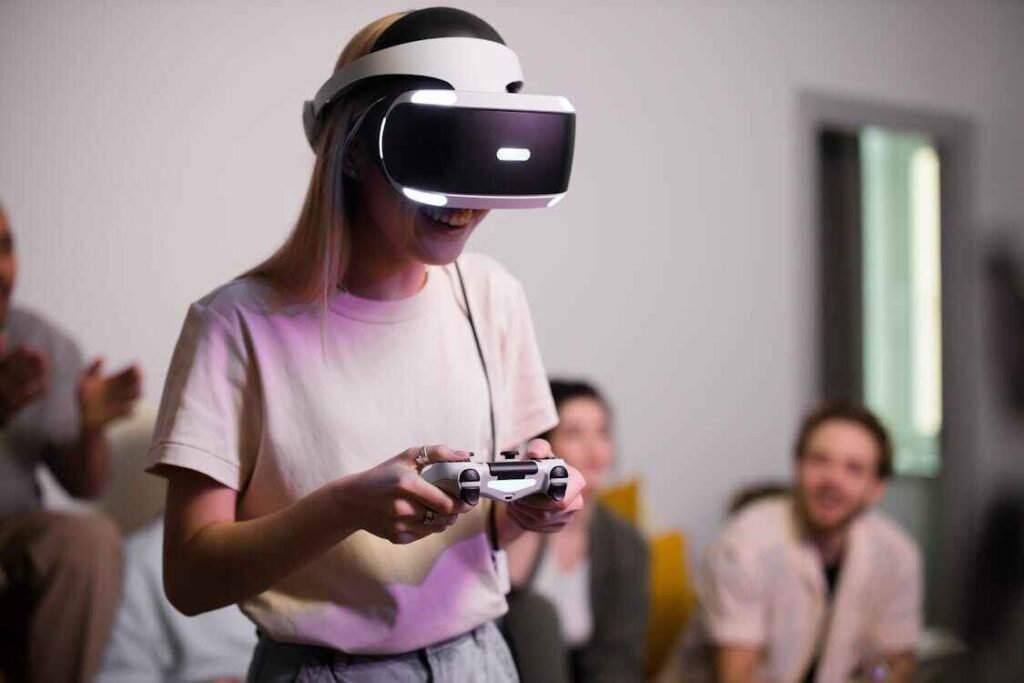 A high school student smiling while playing a VR game with friends, illustrating spending on tech and entertainment