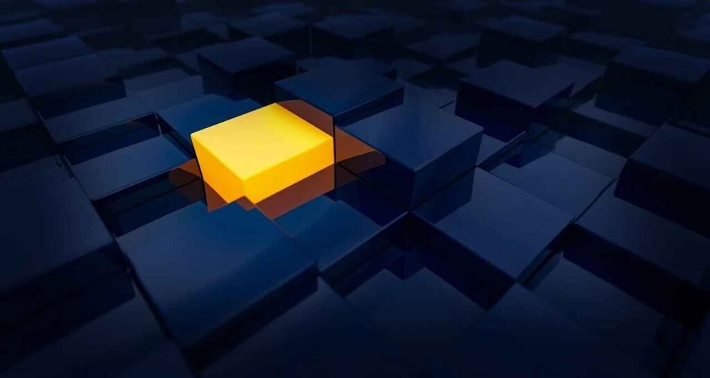 "A single glowing yellow cube standing out among a sea of dark blue cubes, symbolizing the power of individuality and standing apart. This can be tied to the psychology of saving money, where making distinct, deliberate choices can lead to financial growth and success."